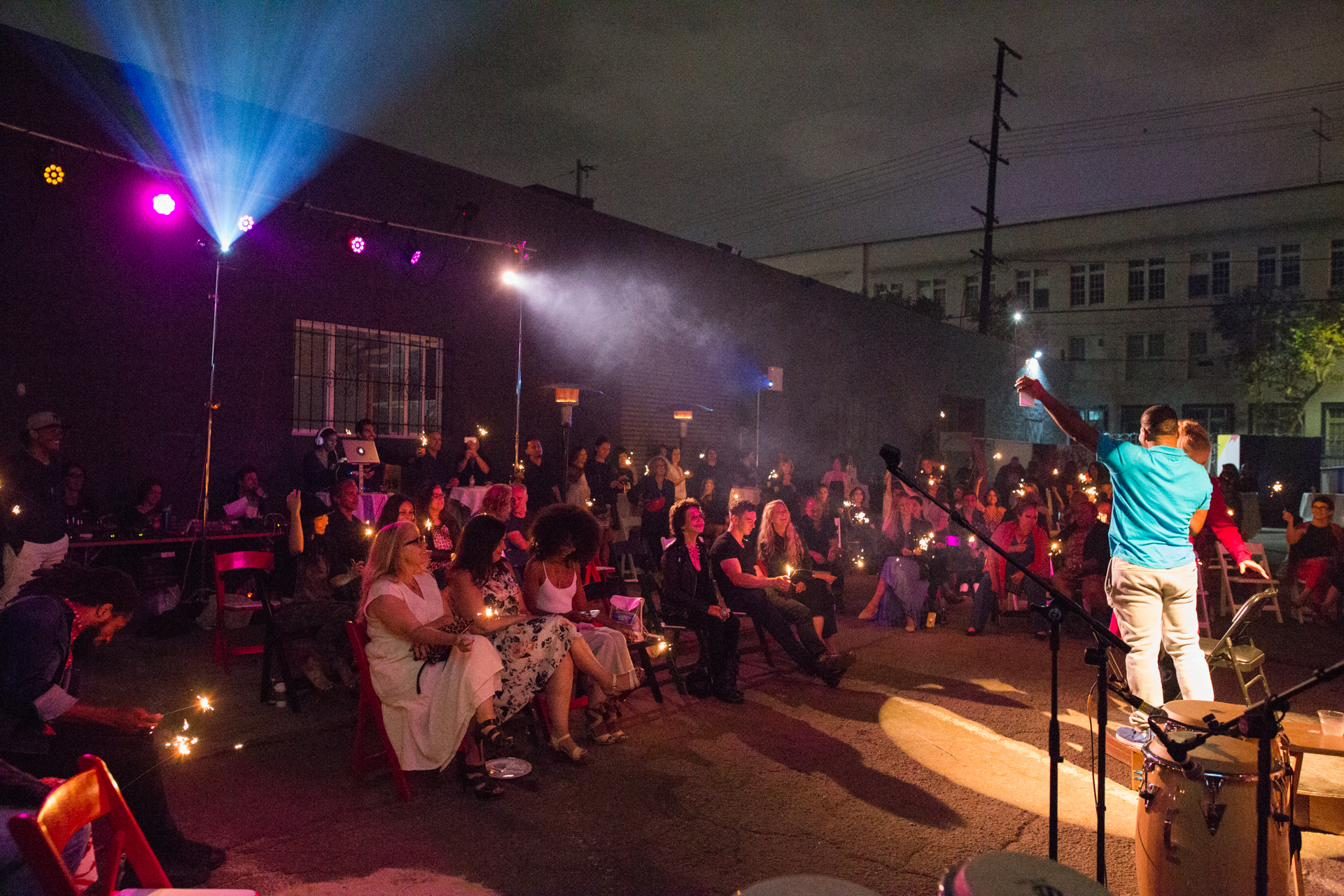 Paint The Mic — an outdoor evening performance under the lights